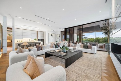 Step into unparalleled luxury in this brand-new custom estate on Jonathans Landing Golf Club in Florida - for sale on GolfHomes.com, golf home, golf lot