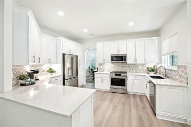 EXQUISITELY RENOVATED 6-BEDROOM POOL HOME IN HUNTER'S GREEN!

 on Hunters Green Country Club in Florida - for sale on GolfHomes.com, golf home, golf lot