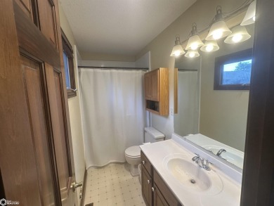 Nestled in a quiet, wooded neighborhood between Sunnyside Park & on Burlington Golf Club in Iowa - for sale on GolfHomes.com, golf home, golf lot