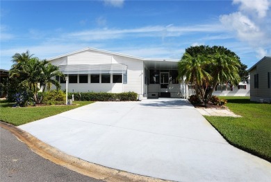 Must see this impeccable, updated 1,894 sq ft home on cul-de-sac on Barefoot Bay Golf Course in Florida - for sale on GolfHomes.com, golf home, golf lot