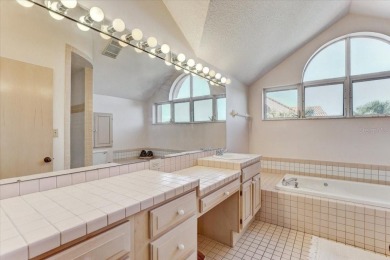 This rare 2 bedroom-3 bedroom, 3 bathroom multi-level townhome on Pasadena Yacht and Country Club in Florida - for sale on GolfHomes.com, golf home, golf lot