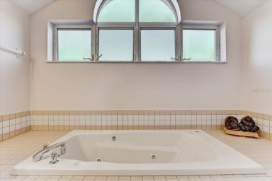 This rare 2 bedroom-3 bedroom, 3 bathroom multi-level townhome on Pasadena Yacht and Country Club in Florida - for sale on GolfHomes.com, golf home, golf lot