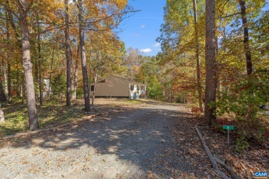 Welcome home to this Great Ranch with vaulted ceilings on Lake Monticello Golf Course in Virginia - for sale on GolfHomes.com, golf home, golf lot