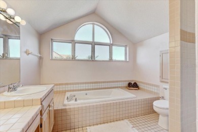 This rare 2 bedroom-3 bedroom, 3 bathroom multi-level townhome on Pasadena Yacht and Country Club in Florida - for sale on GolfHomes.com, golf home, golf lot