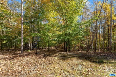 Welcome home to this Great Ranch with vaulted ceilings on Lake Monticello Golf Course in Virginia - for sale on GolfHomes.com, golf home, golf lot