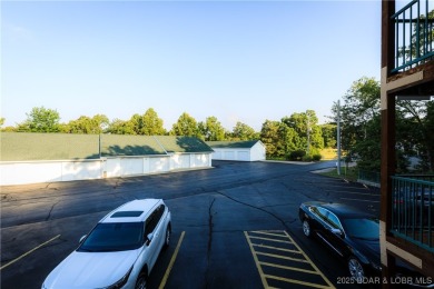 This condo is like living in a treehouse! Very private deck with on Bear Creek Valley Golf Club in Missouri - for sale on GolfHomes.com, golf home, golf lot