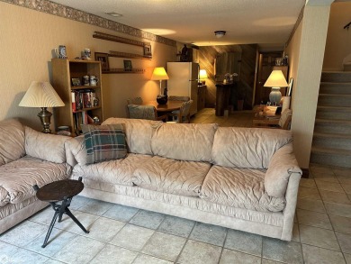 Nestled in a quiet, wooded neighborhood between Sunnyside Park & on Burlington Golf Club in Iowa - for sale on GolfHomes.com, golf home, golf lot
