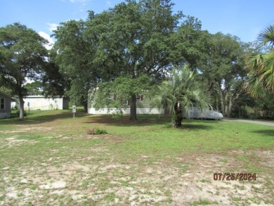 Very well maintained 2-bedroom and 2 bath mobile home that is on St. James Bay in Florida - for sale on GolfHomes.com, golf home, golf lot