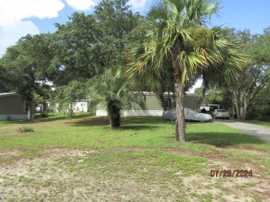 Very well maintained 2-bedroom and 2 bath mobile home that is on St. James Bay in Florida - for sale on GolfHomes.com, golf home, golf lot