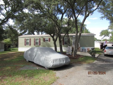 Very well maintained 2-bedroom and 2 bath mobile home that is on St. James Bay in Florida - for sale on GolfHomes.com, golf home, golf lot