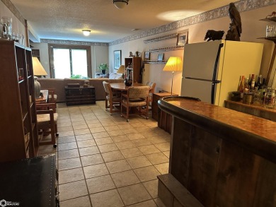 Nestled in a quiet, wooded neighborhood between Sunnyside Park & on Burlington Golf Club in Iowa - for sale on GolfHomes.com, golf home, golf lot