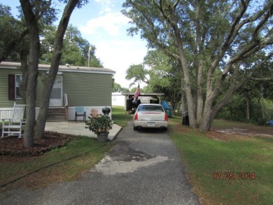 Very well maintained 2-bedroom and 2 bath mobile home that is on St. James Bay in Florida - for sale on GolfHomes.com, golf home, golf lot