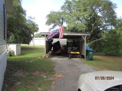 Very well maintained 2-bedroom and 2 bath mobile home that is on St. James Bay in Florida - for sale on GolfHomes.com, golf home, golf lot