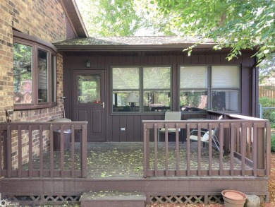 Nestled in a quiet, wooded neighborhood between Sunnyside Park & on Burlington Golf Club in Iowa - for sale on GolfHomes.com, golf home, golf lot