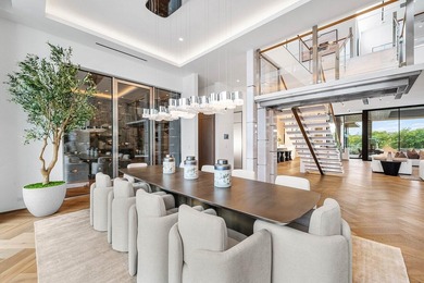 Step into unparalleled luxury in this brand-new custom estate on Jonathans Landing Golf Club in Florida - for sale on GolfHomes.com, golf home, golf lot