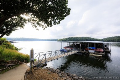 This condo is like living in a treehouse! Very private deck with on Bear Creek Valley Golf Club in Missouri - for sale on GolfHomes.com, golf home, golf lot