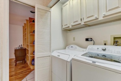 This rare 2 bedroom-3 bedroom, 3 bathroom multi-level townhome on Pasadena Yacht and Country Club in Florida - for sale on GolfHomes.com, golf home, golf lot