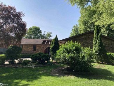 Nestled in a quiet, wooded neighborhood between Sunnyside Park & on Burlington Golf Club in Iowa - for sale on GolfHomes.com, golf home, golf lot