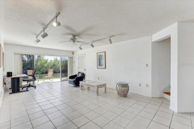 This rare 2 bedroom-3 bedroom, 3 bathroom multi-level townhome on Pasadena Yacht and Country Club in Florida - for sale on GolfHomes.com, golf home, golf lot