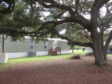 Very well maintained 2-bedroom and 2 bath mobile home that is on St. James Bay in Florida - for sale on GolfHomes.com, golf home, golf lot