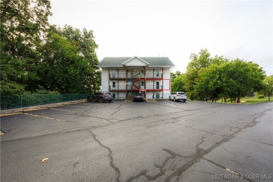 This condo is like living in a treehouse! Very private deck with on Bear Creek Valley Golf Club in Missouri - for sale on GolfHomes.com, golf home, golf lot