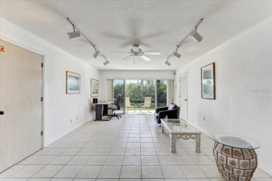 This rare 2 bedroom-3 bedroom, 3 bathroom multi-level townhome on Pasadena Yacht and Country Club in Florida - for sale on GolfHomes.com, golf home, golf lot