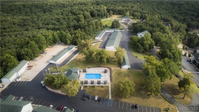 This condo is like living in a treehouse! Very private deck with on Bear Creek Valley Golf Club in Missouri - for sale on GolfHomes.com, golf home, golf lot