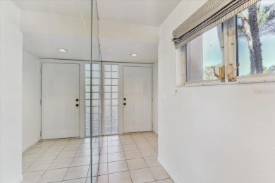 This rare 2 bedroom-3 bedroom, 3 bathroom multi-level townhome on Pasadena Yacht and Country Club in Florida - for sale on GolfHomes.com, golf home, golf lot