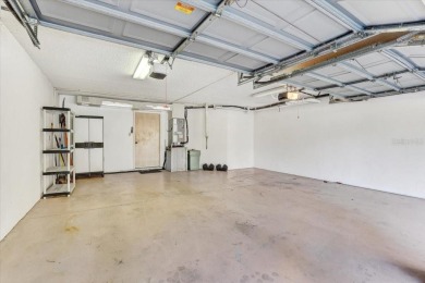 This rare 2 bedroom-3 bedroom, 3 bathroom multi-level townhome on Pasadena Yacht and Country Club in Florida - for sale on GolfHomes.com, golf home, golf lot