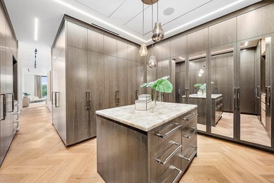 Step into unparalleled luxury in this brand-new custom estate on Jonathans Landing Golf Club in Florida - for sale on GolfHomes.com, golf home, golf lot