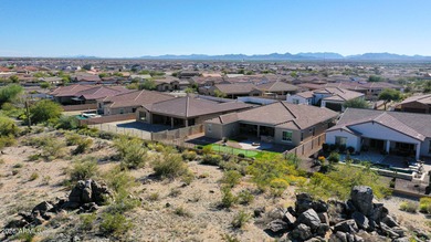 This exceptional energy-efficient 4-bedroom, 3.5-bath home with on Estrella Mountain Ranch Golf Course in Arizona - for sale on GolfHomes.com, golf home, golf lot
