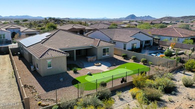 This exceptional energy-efficient 4-bedroom, 3.5-bath home with on Estrella Mountain Ranch Golf Course in Arizona - for sale on GolfHomes.com, golf home, golf lot