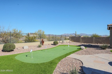 This exceptional energy-efficient 4-bedroom, 3.5-bath home with on Estrella Mountain Ranch Golf Course in Arizona - for sale on GolfHomes.com, golf home, golf lot