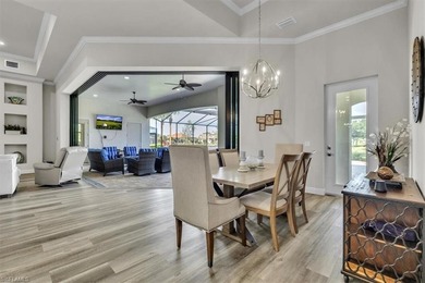 Discover the epitome of luxurious, low maintenance living in on River Hall Country Club in Florida - for sale on GolfHomes.com, golf home, golf lot