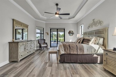 Discover the epitome of luxurious, low maintenance living in on River Hall Country Club in Florida - for sale on GolfHomes.com, golf home, golf lot