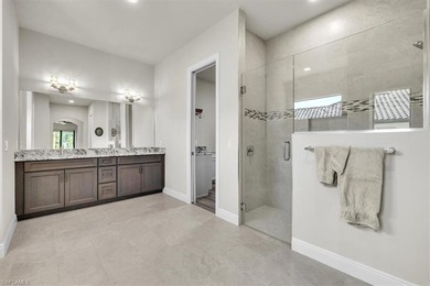 Discover the epitome of luxurious, low maintenance living in on River Hall Country Club in Florida - for sale on GolfHomes.com, golf home, golf lot