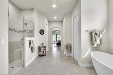 Discover the epitome of luxurious, low maintenance living in on River Hall Country Club in Florida - for sale on GolfHomes.com, golf home, golf lot