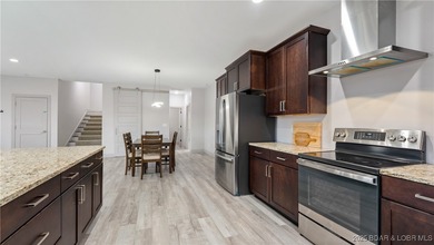 New construction located on fairway #3 of the prestigious Club on The Club At Porto Cima in Missouri - for sale on GolfHomes.com, golf home, golf lot