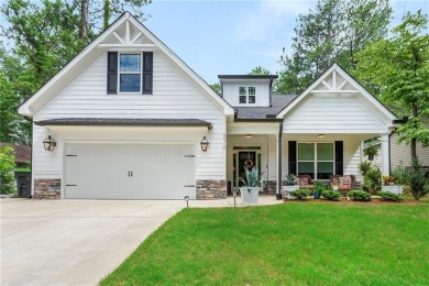 This lovely custom-built home offers a flowing, spacious on Fairfield Plantation Golf and Country Club in Georgia - for sale on GolfHomes.com, golf home, golf lot