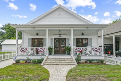 This gorgeous bungalow in Old Town Bay Saint Louis is Coastal on The Bridges Golf Club At Hollywood Casino in Mississippi - for sale on GolfHomes.com, golf home, golf lot