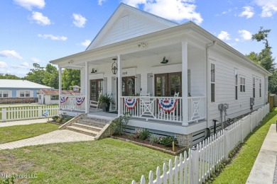 This gorgeous bungalow in Old Town Bay Saint Louis is Coastal on The Bridges Golf Club At Hollywood Casino in Mississippi - for sale on GolfHomes.com, golf home, golf lot