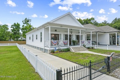 This gorgeous bungalow in Old Town Bay Saint Louis is Coastal on The Bridges Golf Club At Hollywood Casino in Mississippi - for sale on GolfHomes.com, golf home, golf lot