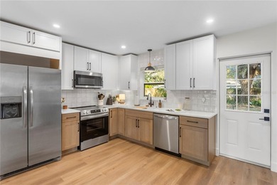 This fully remodeled 2 bedroom, 1.5 bathroom single story home on The Dunedin Country Club in Florida - for sale on GolfHomes.com, golf home, golf lot