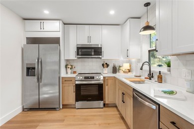 This fully remodeled 2 bedroom, 1.5 bathroom single story home on The Dunedin Country Club in Florida - for sale on GolfHomes.com, golf home, golf lot