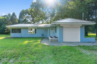 This beautifully renovated 3-bedroom, 1-bathroom residence is on Grande Golf Club in Michigan - for sale on GolfHomes.com, golf home, golf lot