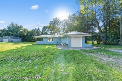 This beautifully renovated 3-bedroom, 1-bathroom residence is on Grande Golf Club in Michigan - for sale on GolfHomes.com, golf home, golf lot