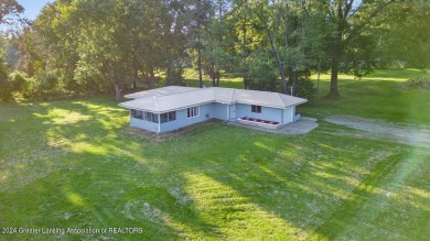 This beautifully renovated 3-bedroom, 1-bathroom residence is on Grande Golf Club in Michigan - for sale on GolfHomes.com, golf home, golf lot