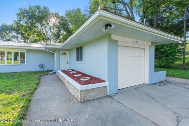 This beautifully renovated 3-bedroom, 1-bathroom residence is on Grande Golf Club in Michigan - for sale on GolfHomes.com, golf home, golf lot