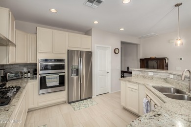 Welcome to a beautifully upgraded corner-lot home located in on Poston Butte Golf Club in Arizona - for sale on GolfHomes.com, golf home, golf lot