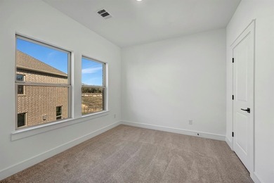 Fabulous two-story home located at Heath Golf and Yacht Club in on Heath Golf and Yacht Club in Texas - for sale on GolfHomes.com, golf home, golf lot